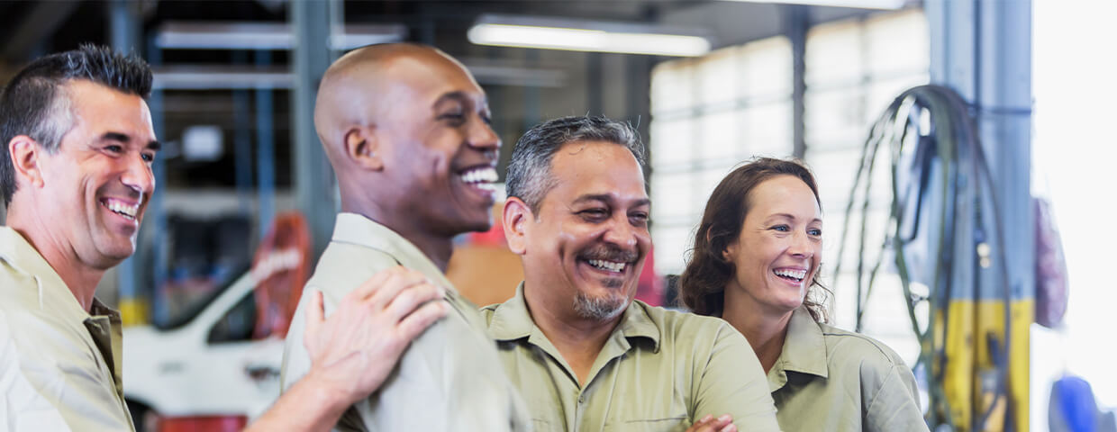 Group of employees smiling together